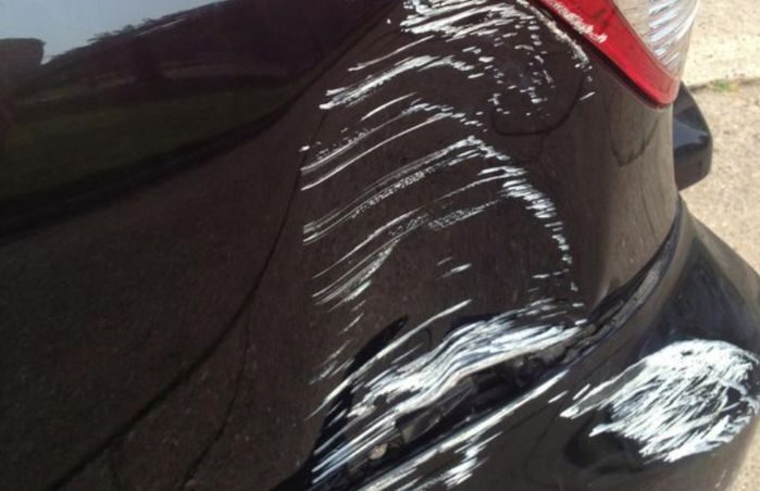 dent and scratch on vehicle