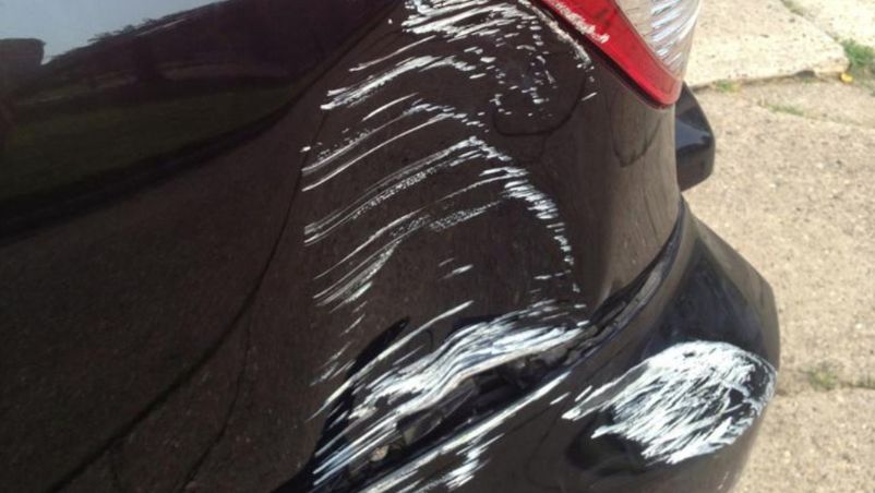 dent and scratch on vehicle
