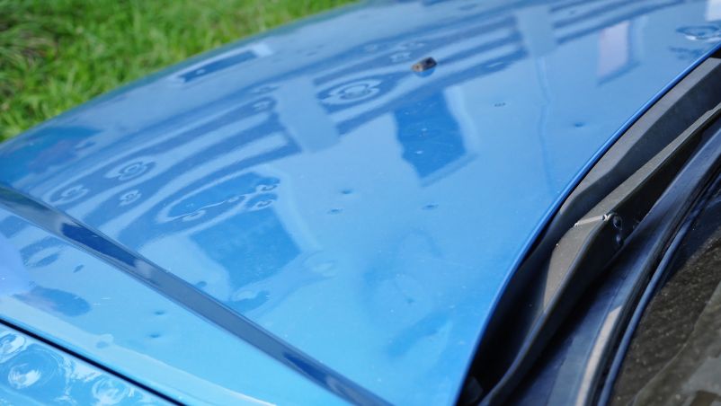 hail damage on hood of car