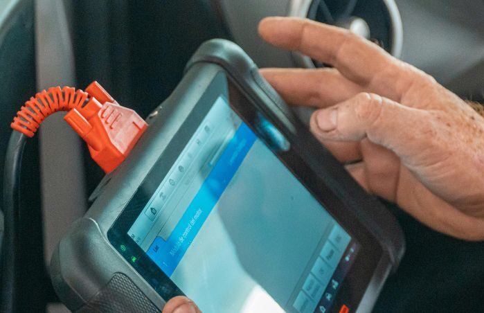 vehicle wellness, diagnostic scanning in progress