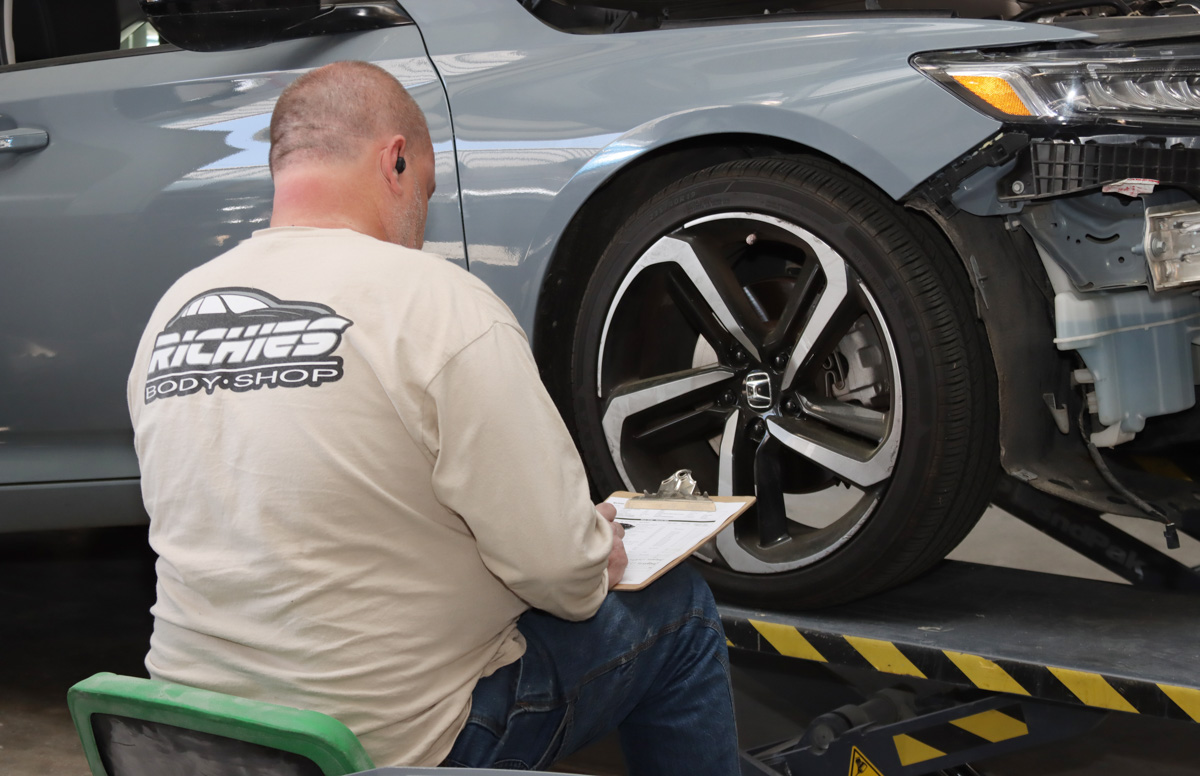 wheels being balanced and aligned at Richies Body Shop